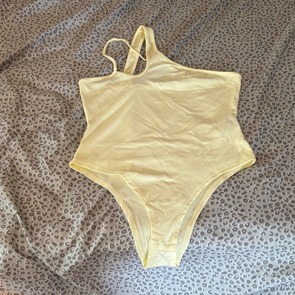 Yellow body suit